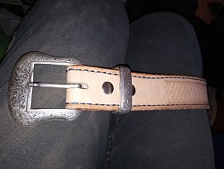 This western flower design buckle I got from a belt I bought 3-4 years ago. $50 for a brown unstamped machine stitched belt.